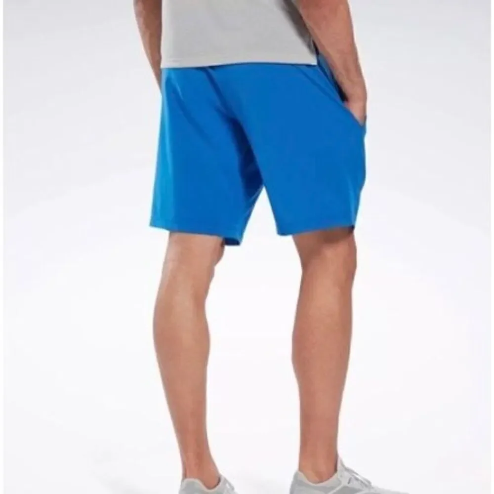 REEBOK - NWT - M Sz Medium Speedwick Active Shorts in Victor Blue. POCKETS!